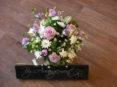 Funeral Pretty posy - Pretty posy arrangement in delicate soft flowers giving a cottage garden style to the design. For a funeral or remembrance.