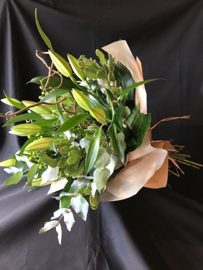 Rustic bouquet - A beautiful selection of lily, foliage and sticks giving a natural rustic style to the bouquet.