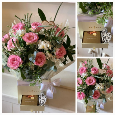 Luxury Gift Box Flowers and Chocolates - Nothing says how much you love someone more than flowers and chocolates. So this gift box says love in abundance with a combination of both. In the top of the perfect gift box is an arrangement of stunning romantic flowers presented in pretty gift wrapping. Below in the drawer section of the box your loved one will find a box of delicious chocolates and a rustic heart decoration.

Perfect for wooing and wowing!!

We deliver to all areas in our locality, including Gosport, Fareham, lee-on-Solent, Stubbington, Titchfield and their surrounding areas. We offer a same day delivery on all orders placed before 2pm. A click and collect service is offered through our website if you prefer. All of our designs are made by our highly trained skilful florists on site. On our website you can find flower arrangements for every occasion. Although our website is vast and varied we aware that some customers have special requirements that we are always available to consult in order to meet all your floral needs. Contact details as follows, you can call us on 023 92520123, use our contact page to send us a message or even come into the shop and see us face to face.