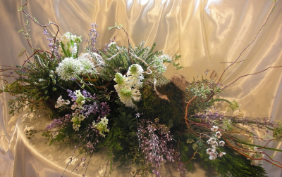 Wild and Wonderful - Image taking a walk through beautiful heathland, stopping every now and then to admire the clumps of delicate little flowers growing in the undergrowth, this is what inspired us to create this arrangement. The beauty of this arrangement speaks for its self, all the materials used have been created by nature its self. This design is approximately 3ft. Design may varu from the image shown. We would need 3 working days notice to create this design. We deliver to all funeral directors in our locality, including Gosport, Fareham, Lee-on-the-Solent, Stubbington, Titchfield and surrounding areas. All of our designs are made by our highly trained and skilful florists on site. Although our website is vast and vareid we are also aware that some customers have special requirements that we are always available to consult in order to meet all of your floral needs. Contact details as follows, you can call us on 023 92520123, use our contact page through our website to send us a message or even come into the shop and see us face to face.