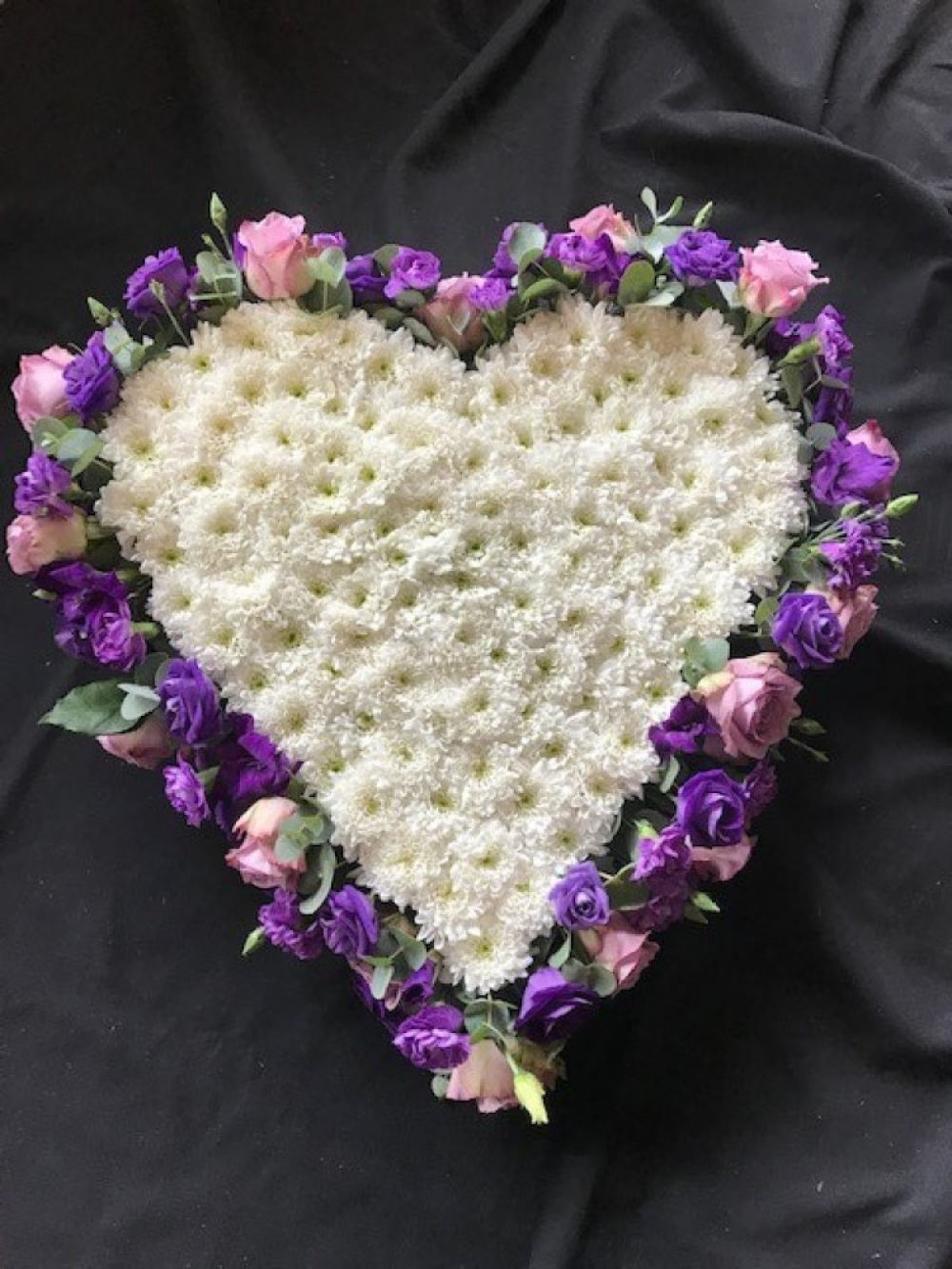 Flower edged funeral heart